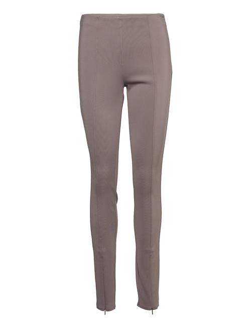 Se Calvin Klein Technical Knit Skinny Legging Calvin Klein Brown ved Booztlet