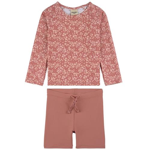 Se Kuling Rhodes Mønstret UV-sæt Desert Pink Flower | Lyserød | 86/92 cm ved Babyshop