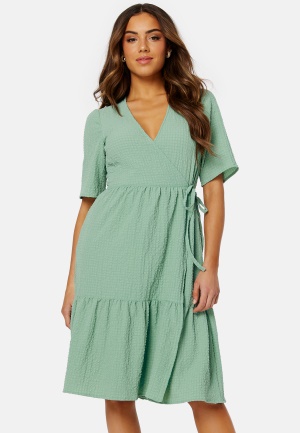 Se BUBBLEROOM Krystal wrap dress Green S ved Bubbleroom