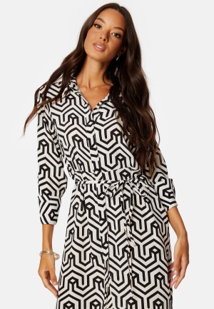 Se VILA Daca Sana L/S Midi Calf Shirt Dress Black AOP:SANA 36 ved Bubbleroom