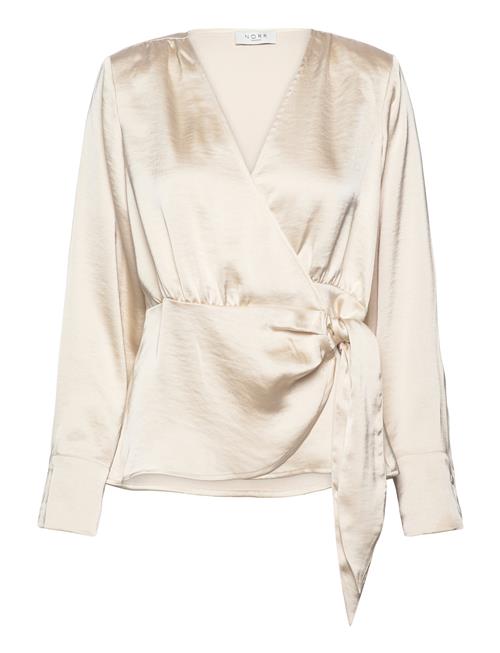 Se NORR Gili Wrap Top NORR Beige ved Booztlet