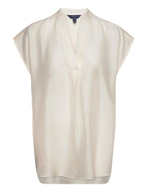 Se GANT Rel Sleeveless Stand Collar Blouse GANT Cream ved Booztlet