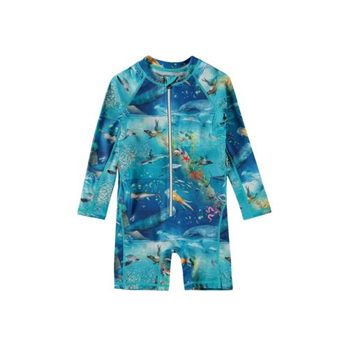 Se Molo Neka UV-dragt Ocean Zones | Blå | 86/92 cm ved Babyshop