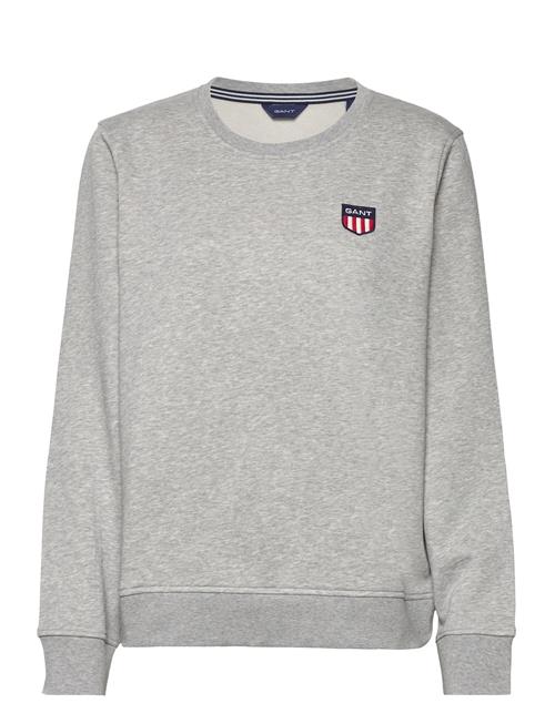 Se GANT Reg Retro Shield C-Neck Sweat GANT Grey ved Booztlet