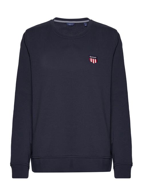 Se GANT Reg Retro Shield C-Neck Sweat GANT Navy ved Booztlet