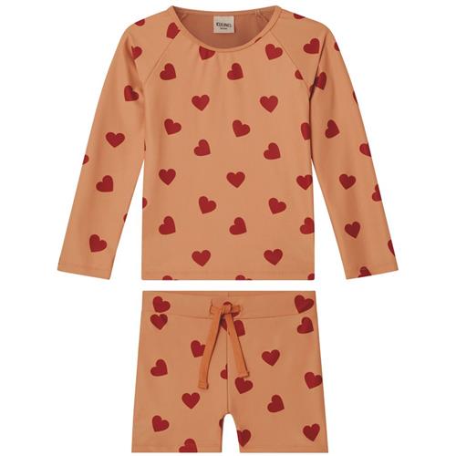 Se Kuling Rhodes Hjertemønstret UV-sæt Terracotta | Orange | 86/92 cm ved Babyshop