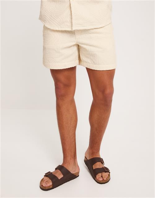 Se OAS Terry Shorts Joggingshorts Beige ved NLY Man