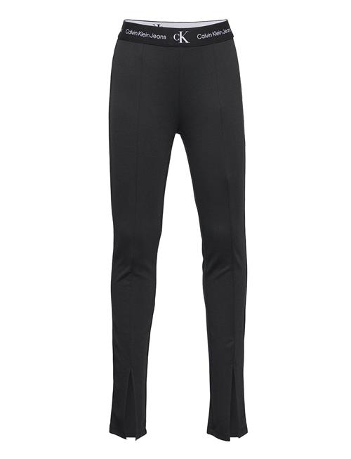 Se Calvin Klein Punto Tape Slit Pants Calvin Klein Black ved Booztlet