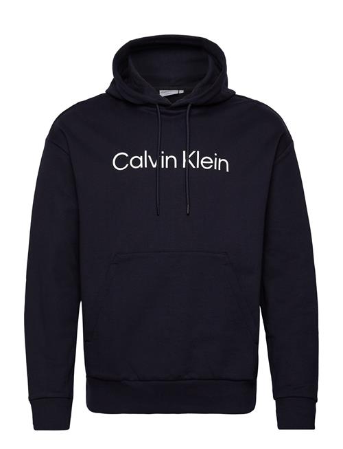 Se Calvin Klein Hero Logo Comfort Hoodie Calvin Klein Navy ved Booztlet