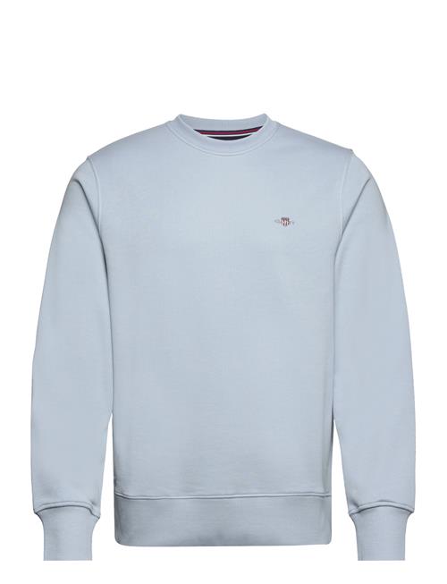 Se GANT Reg Shield C-Neck Sweat GANT Blue ved Booztlet