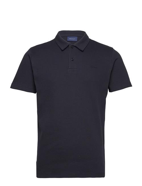 Se GANT Waffle Texture Ss-Pique GANT Navy ved Booztlet