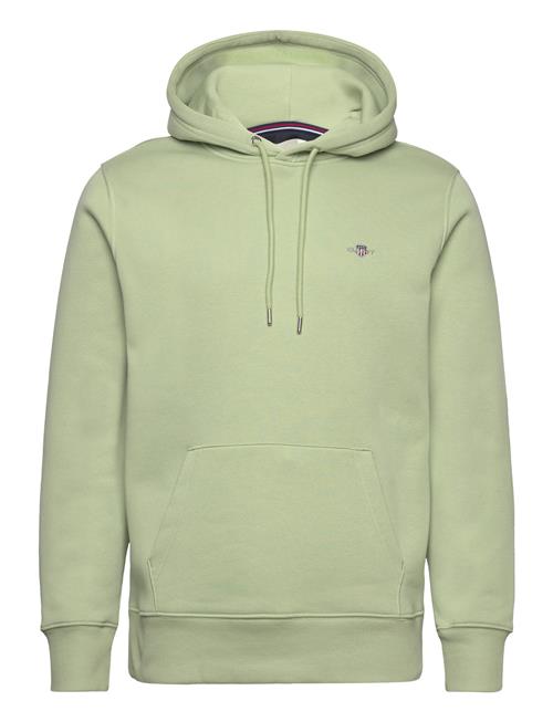 Se GANT Reg Shield Hoodie GANT Green ved Booztlet