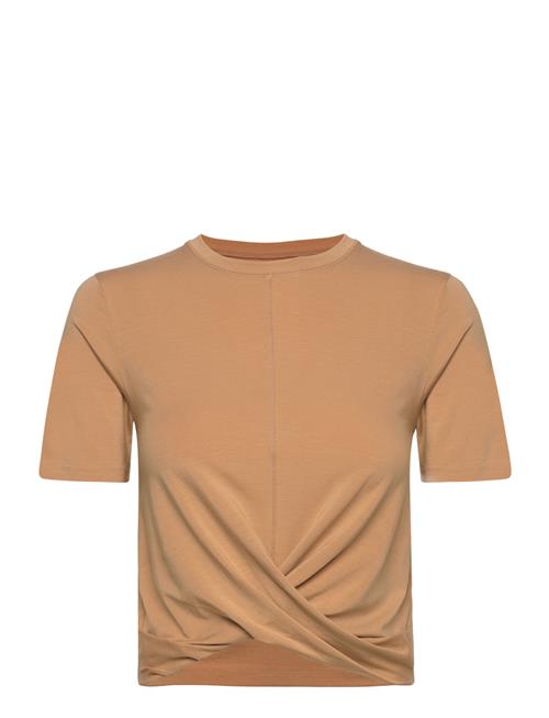 Se Casall Delight Short Wrap Tee Casall Brown ved Booztlet