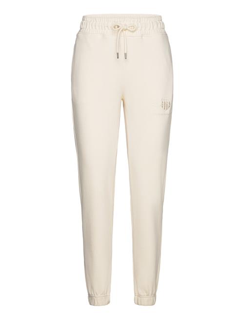 Se GANT Reg Tonal Shield Sweatpants GANT Cream ved Booztlet