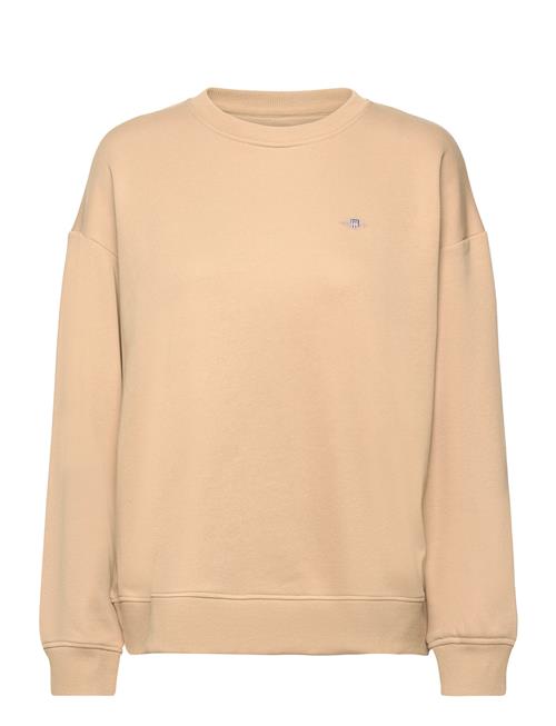 Se GANT Rel Shield C-Neck Sweat GANT Beige ved Booztlet