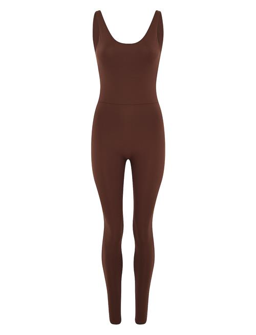 Se Girlfriend Collective Scoop Back Unitard, Long Girlfriend Collective Brown ved Booztlet