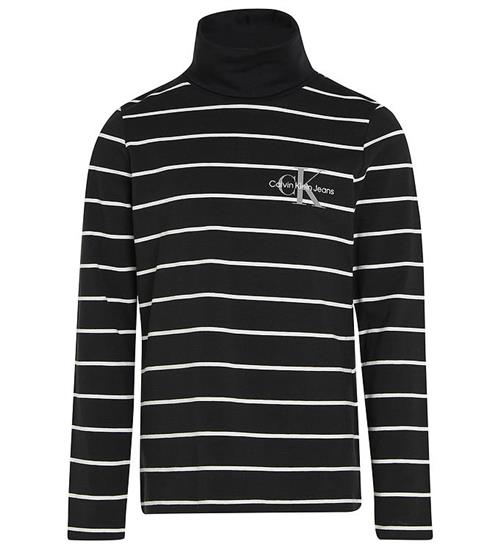 Se Calvin Klein Bluse - Slim Roll Neck - Thin Black Ivory Stripe ved KidsWorld