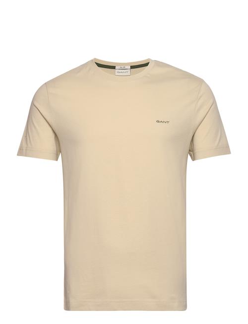 Se GANT Contrast Logo Ss T-Shirt GANT Cream ved Booztlet