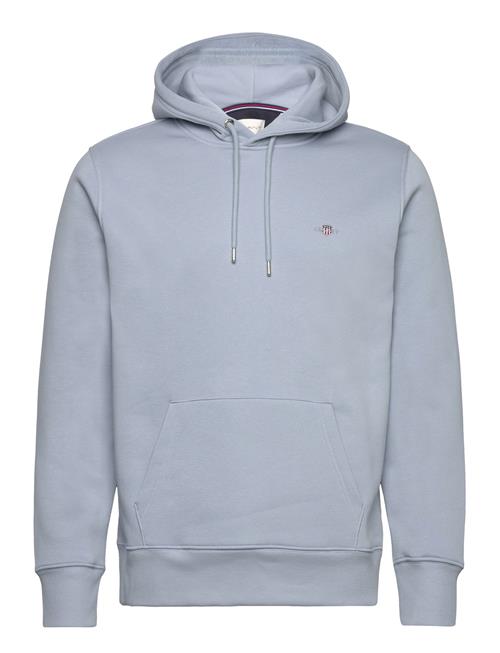 Se GANT Reg Shield Hoodie GANT Blue ved Booztlet