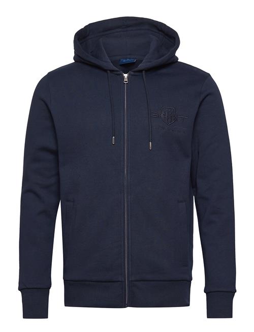 Se GANT Reg Tonal Shield Full Zip Hoodie GANT Blue ved Booztlet