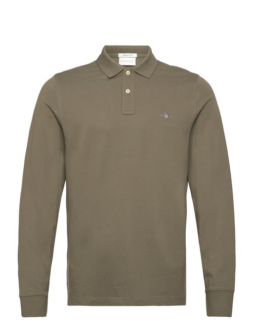 Se GANT Reg Shield Ls Pique Polo GANT Khaki ved Booztlet