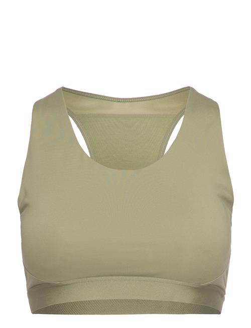 Se New Balance Nb Sleek Medium Support Pocket Sports Bra New Balance Green ved Booztlet