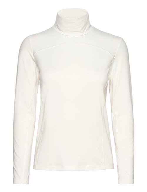 Se PUMA Golf W Lucy Ls Mockneck PUMA Golf Cream ved Booztlet