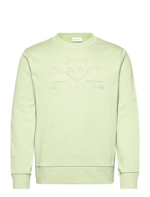 Se GANT Reg Tonal Shield Cneck Sweat GANT Green ved Booztlet