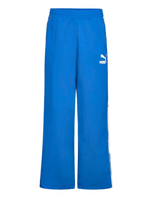 Se PUMA T7 Over D Woven Track Pants PUMA Blue ved Booztlet