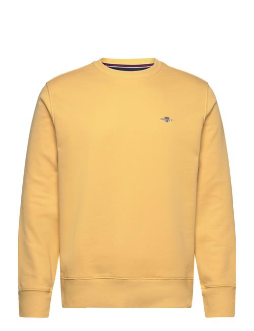 Se GANT Reg Shield C-Neck Sweat GANT Yellow ved Booztlet