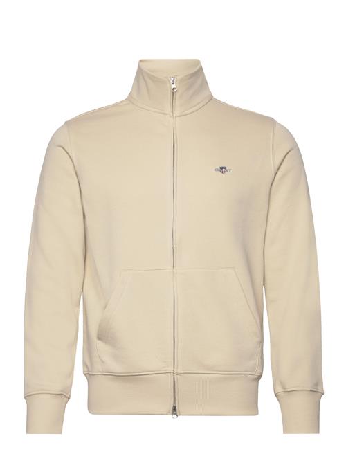 Se GANT Reg Shield Full Zip Sweat GANT Cream ved Booztlet