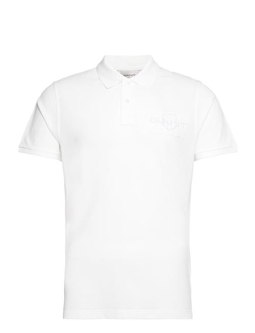 Se GANT Reg Tonal Shield Ss Polo GANT White ved Booztlet