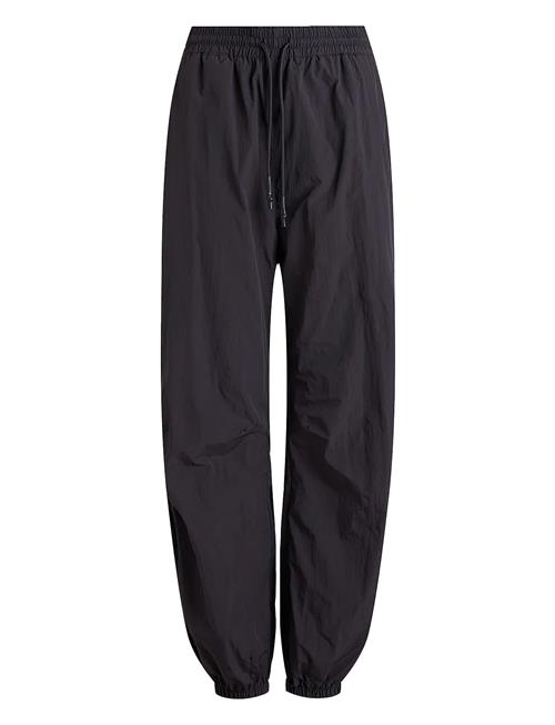 Se Rethinkit Track Loose Pants Palma Rethinkit Black ved Booztlet