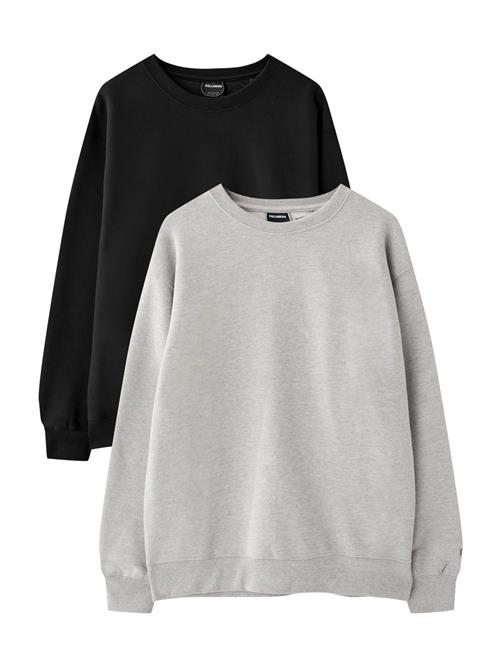 Se Pull&Bear Sweatshirt  grå / sort ved About You