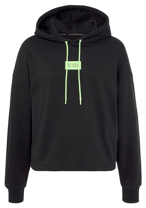 Se LASCANA ACTIVE Sweatshirt  neongrøn / sort ved About You