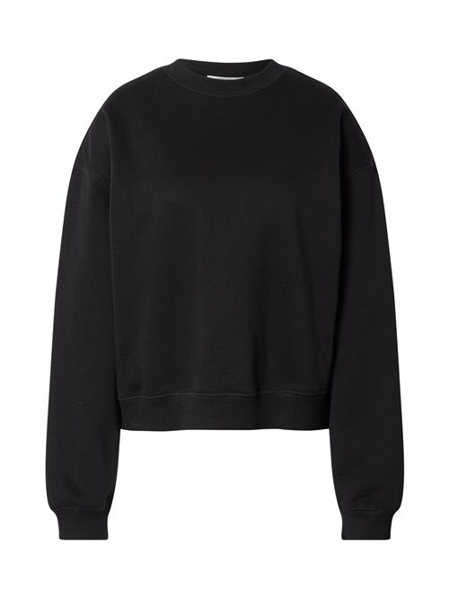 Se WEEKDAY Sweatshirt 'Essence Standard'  sort ved About You