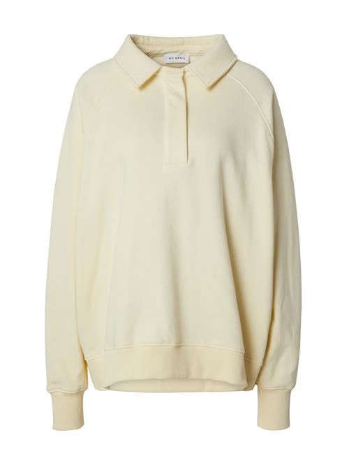 Se OH APRIL Sweatshirt 'Progress'  creme / gran / mandarin ved About You