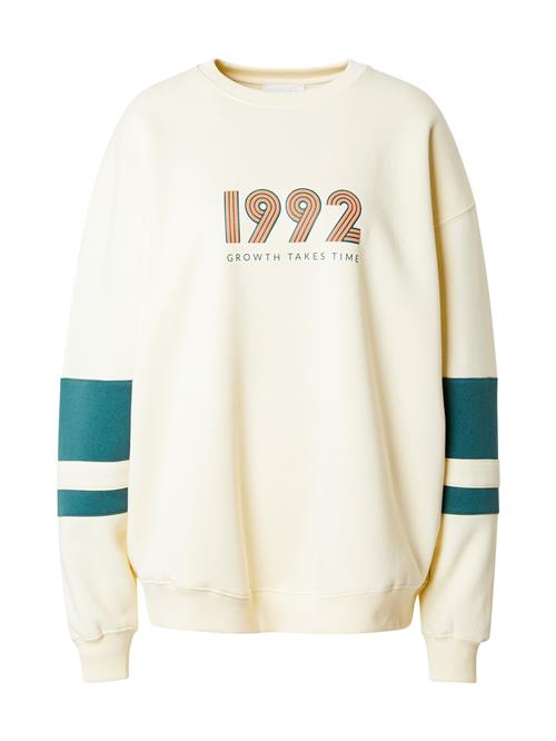 Se OH APRIL Sweatshirt '1992'  elfenben / smaragd / lyseorange ved About You