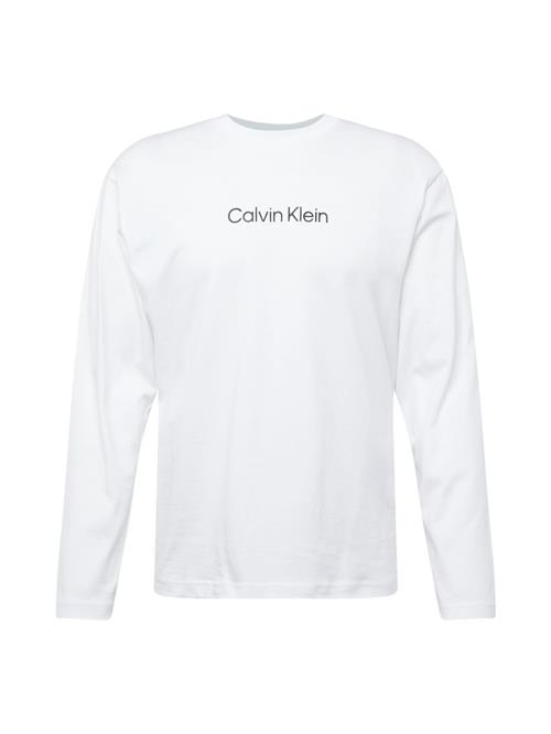 Se Calvin Klein Bluser & t-shirts 'HERO'  sort / hvid ved About You