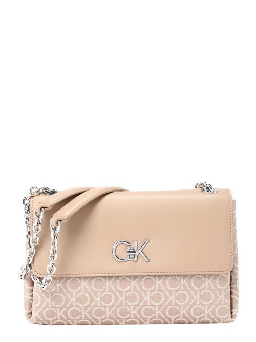 Se Calvin Klein Skuldertaske  beige / creme / sølv ved About You