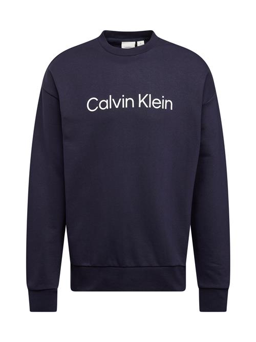 Se Calvin Klein Sweatshirt 'Hero'  marin / hvid ved About You