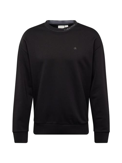 Se Calvin Klein Sweatshirt  grå / sort ved About You