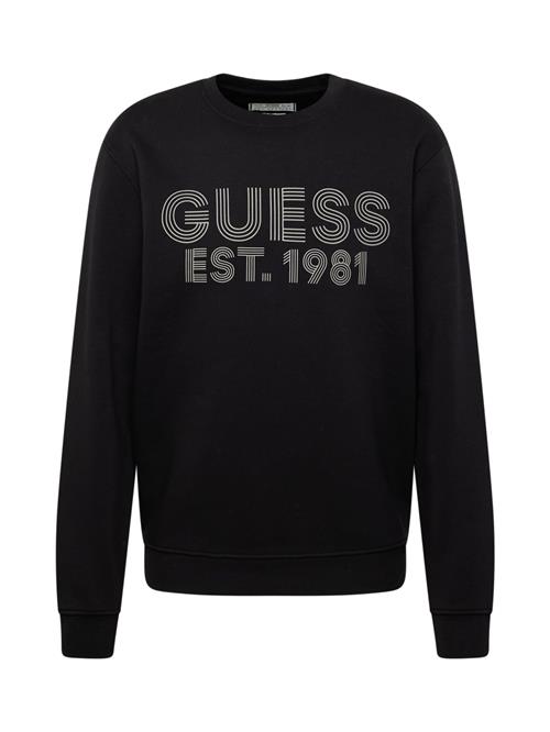 Se GUESS Sweatshirt 'BEAU'  grå / sort ved About You