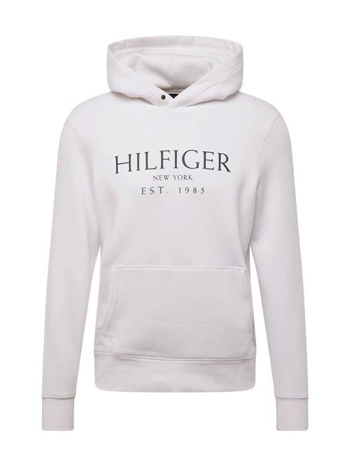 Se TOMMY HILFIGER Sweatshirt  marin / hvid ved About You