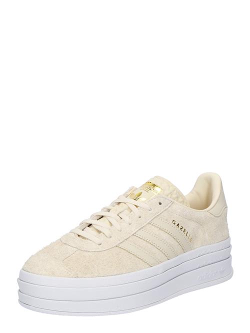 Se ADIDAS ORIGINALS Sneaker low 'Gazelle'  guld / uldhvid ved About You