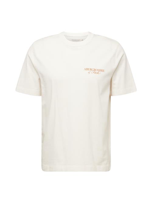 Se Abercrombie & Fitch Bluser & t-shirts 'SEASONAL IMAGERY'  brun / cognac / sort / offwhite ved About You