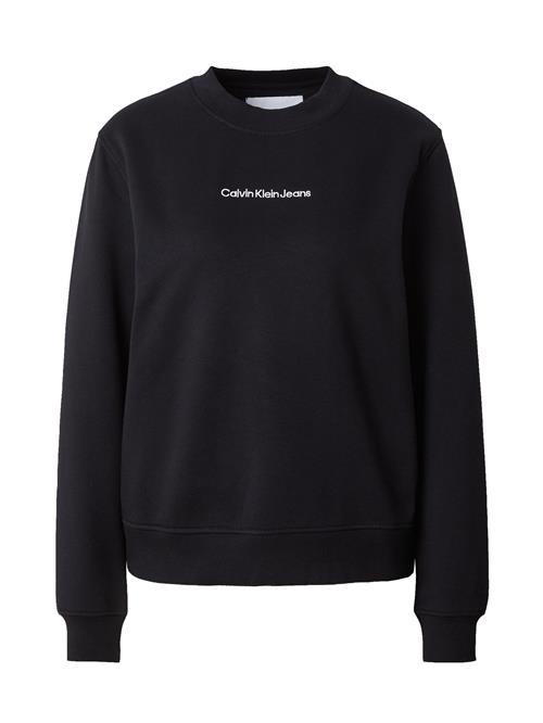 Se Calvin Klein Jeans Sweatshirt 'Institutional'  sort / hvid ved About You