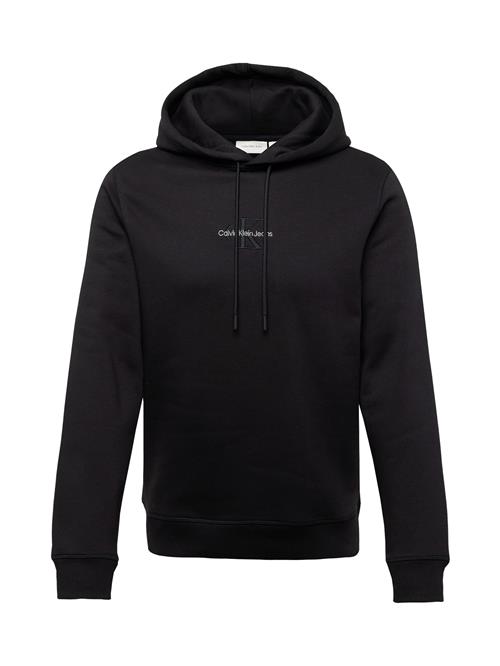 Se Calvin Klein Jeans Sweatshirt  sort / offwhite ved About You