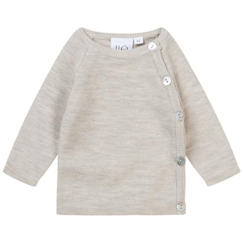 Se Flöss Kaya Strikket Trøje Oat Melange | Beige | 50 cm ved Babyshop