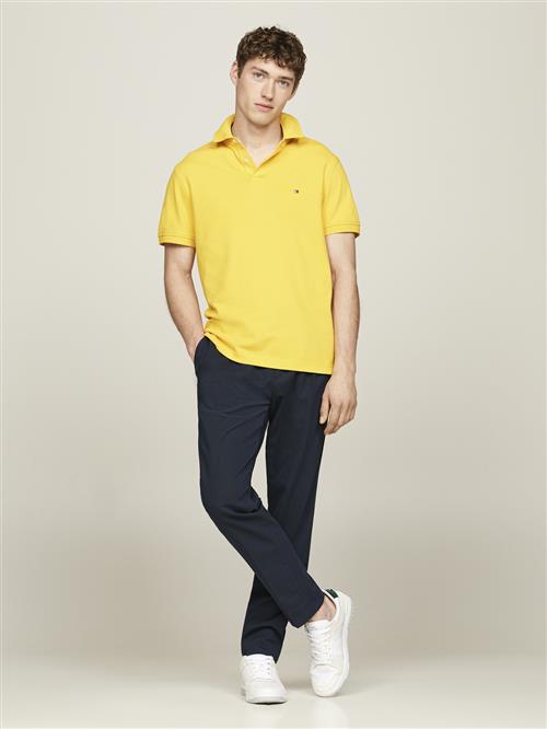 Se Tommy Hilfiger 1985 Regular Polo Mand Primary Yellow Kortærmede Poloer Str XL - hos Magasin ved Magasin